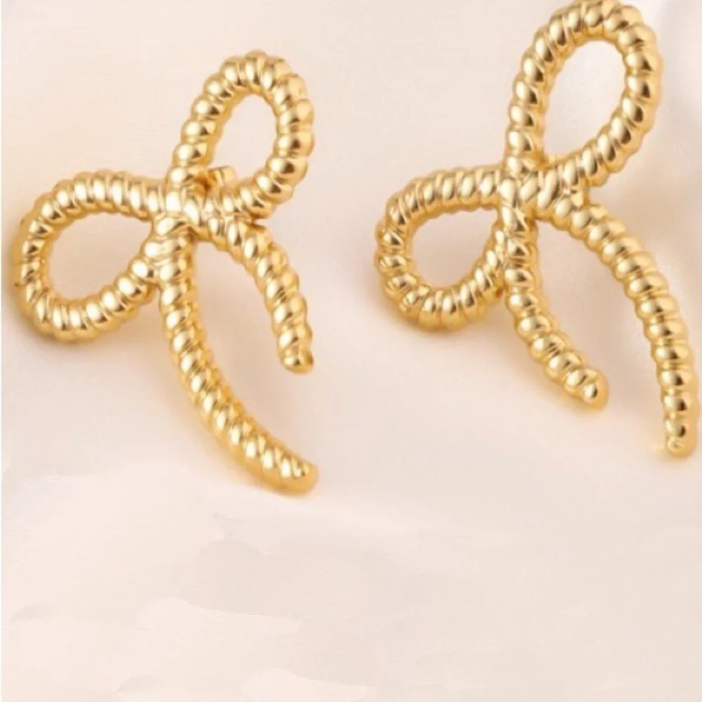 Bow Rope Stud Earrings (2011)